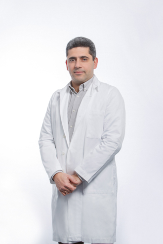 Δρ. Θεοχάρης Καραολίδης